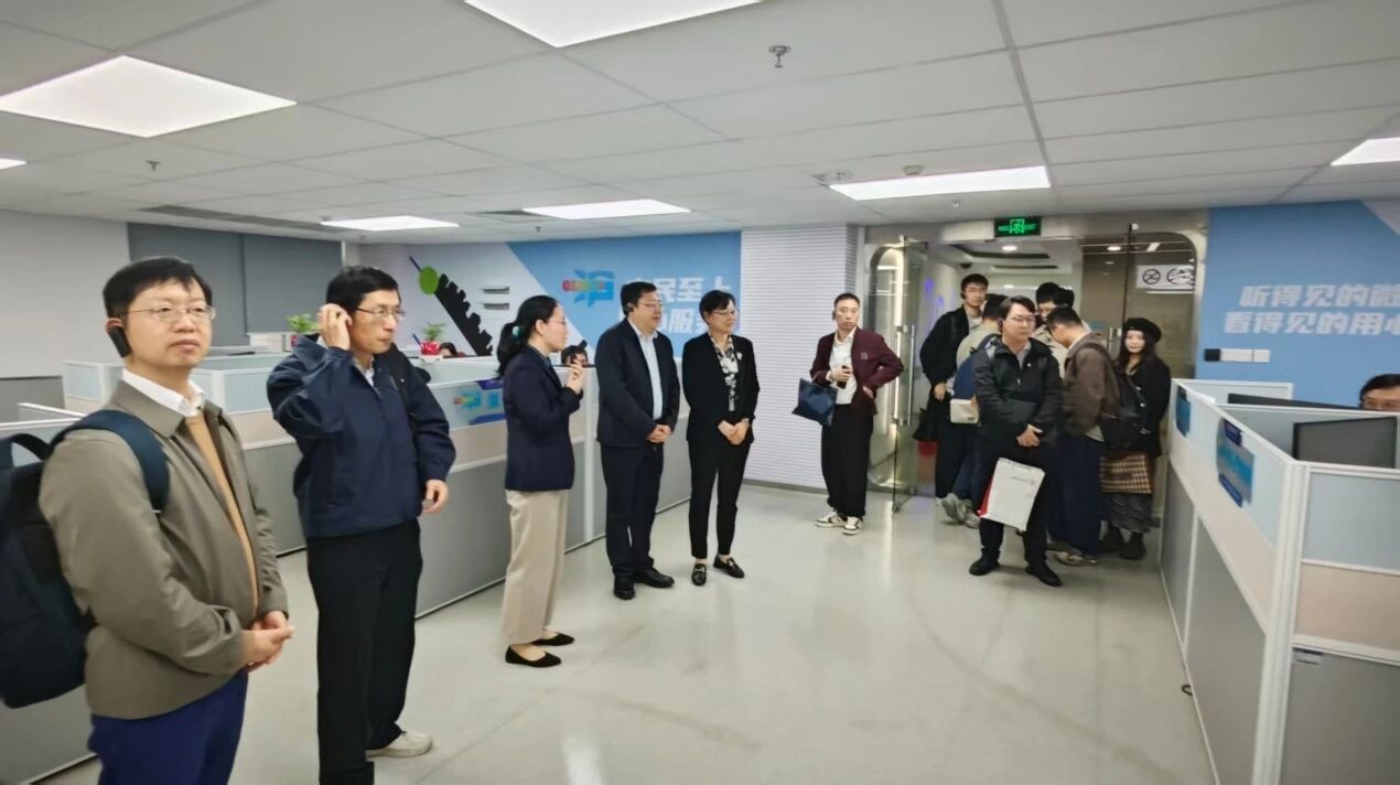 上海交大中国城市治理研究院赴市热线办调研交流